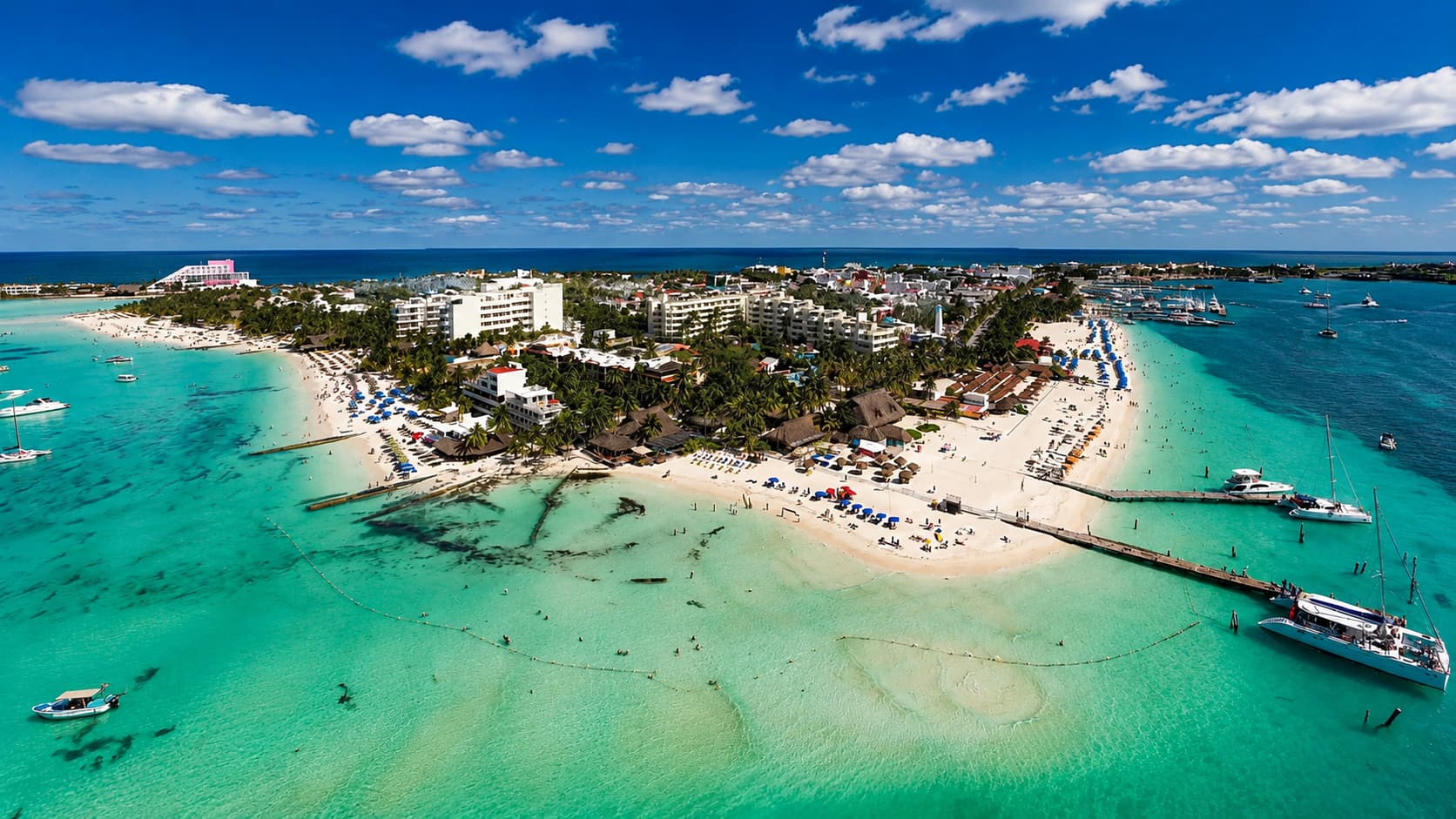 Isla Mujeres from above, surrounded by Caribbean blue