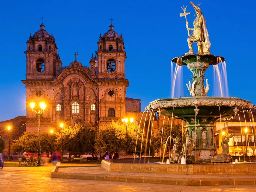 Plaza de Armas after dark, beneath the cathedral lights