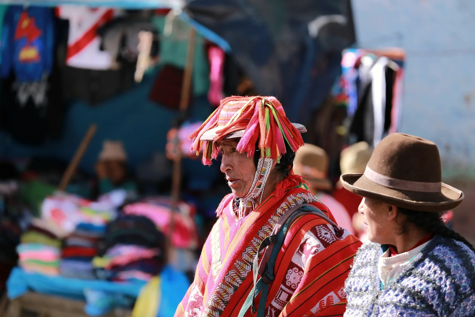Market day in the highlands, in hats and woven cloth