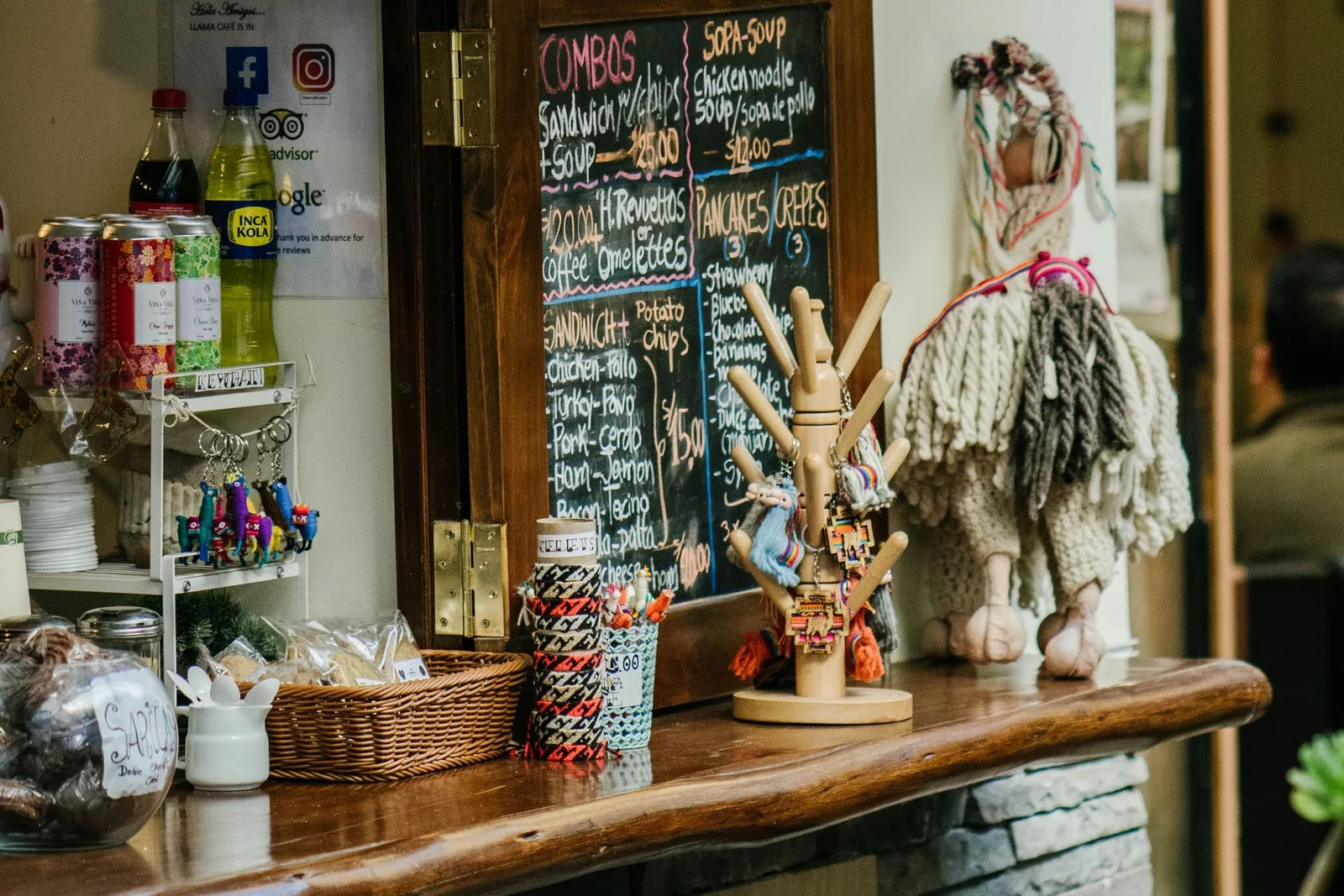 A small coffee counter with a chalk menu