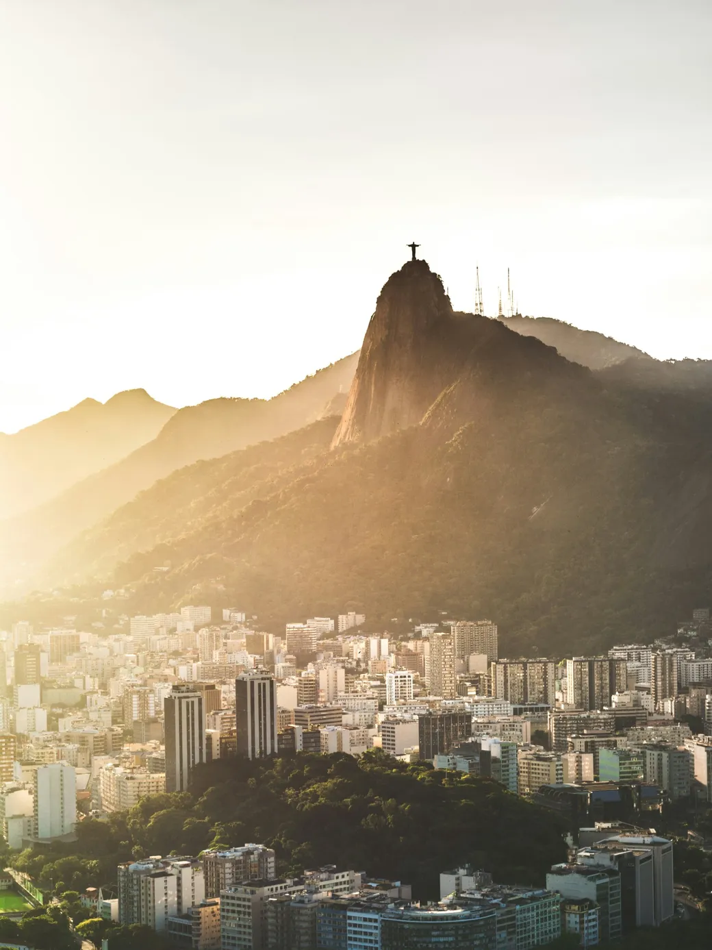 Corcovado against a low sun, the city below it