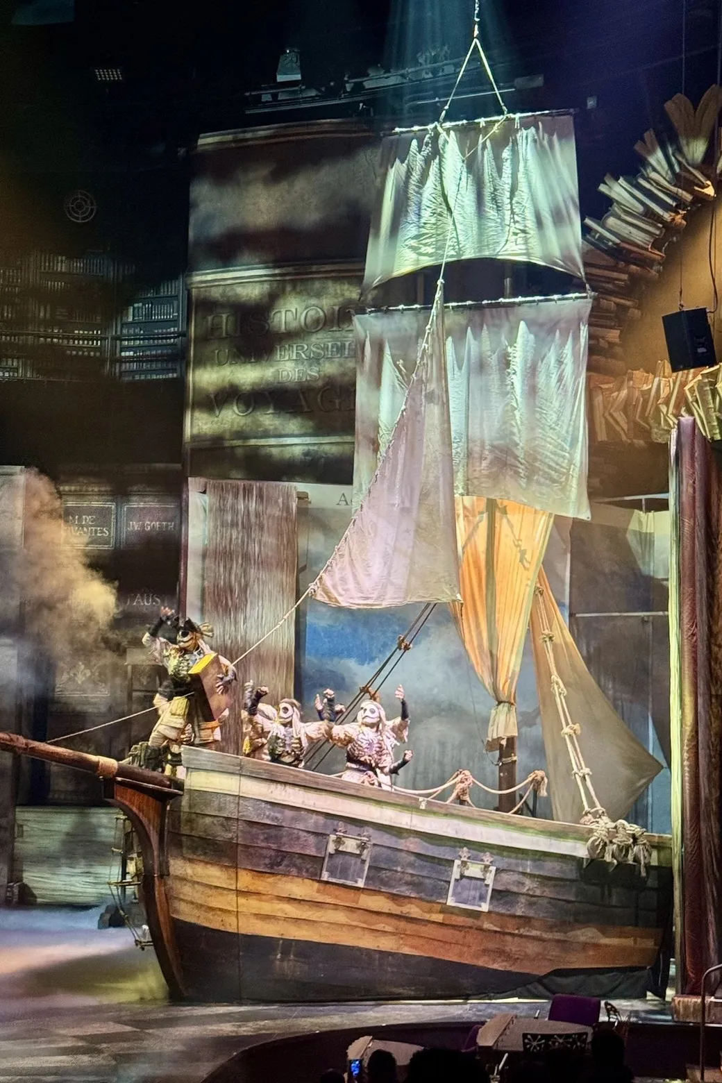 A ship under sail on the JOYÀ stage, performers on deck