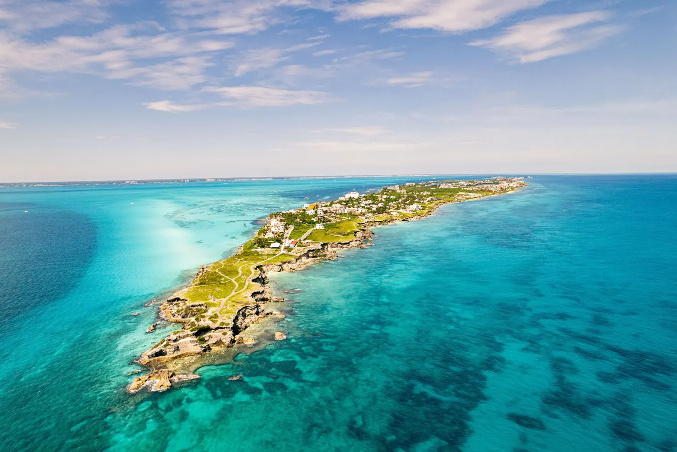 Isla Mujeres from the air, its rocky southern tip in front