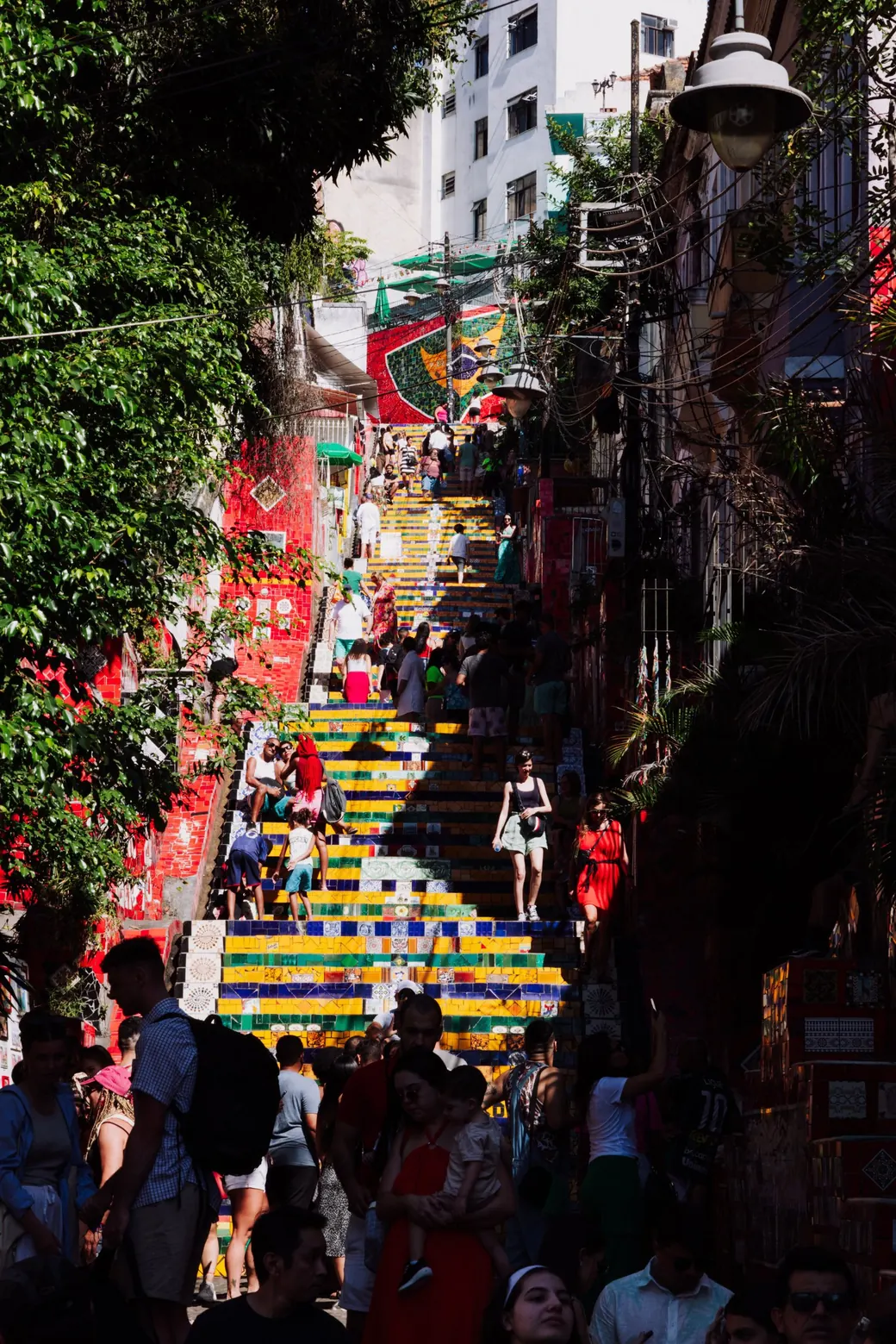 The Selarón Steps at a busy hour, tiles under every foot