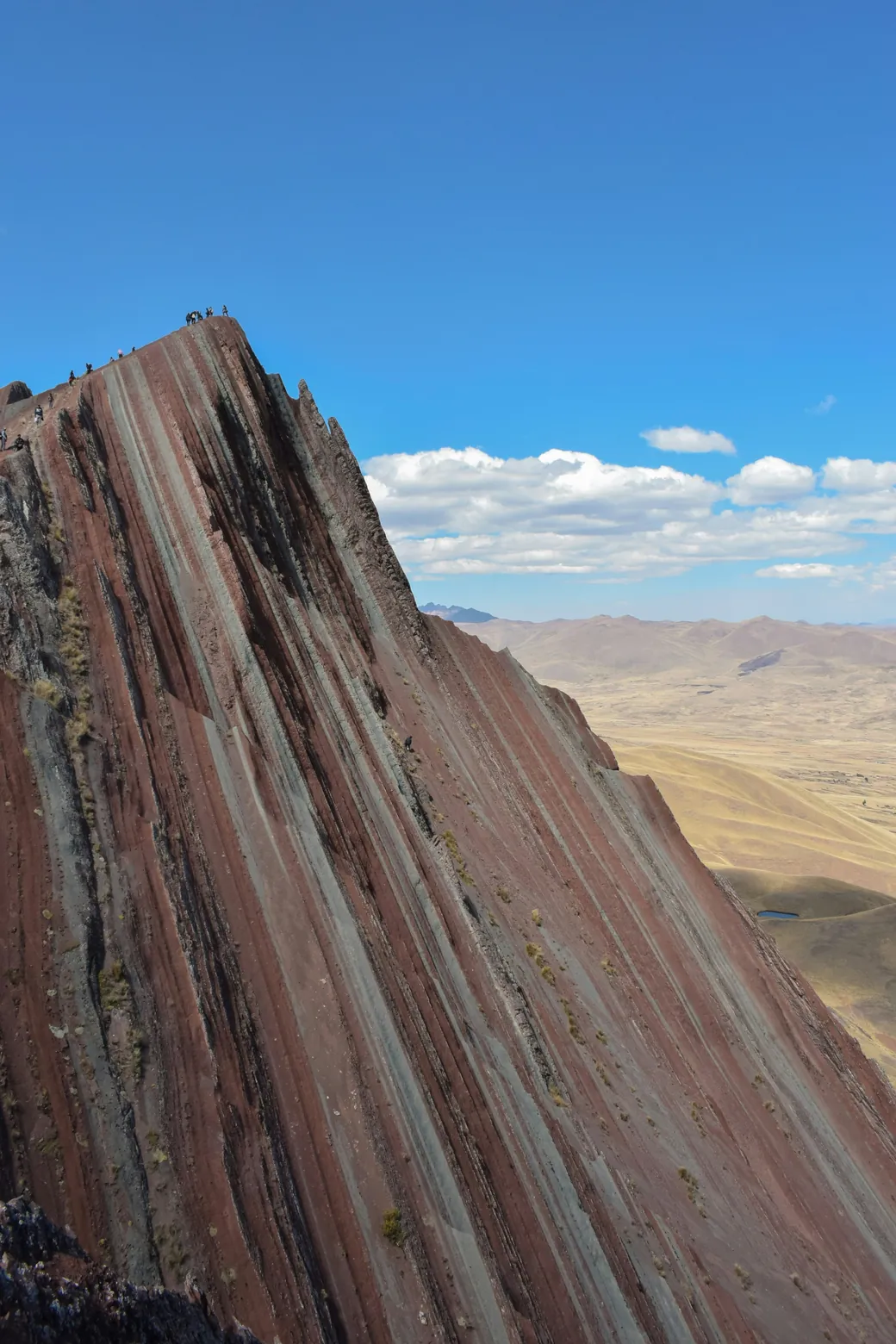 The striped ridge rising steeply from the plateau