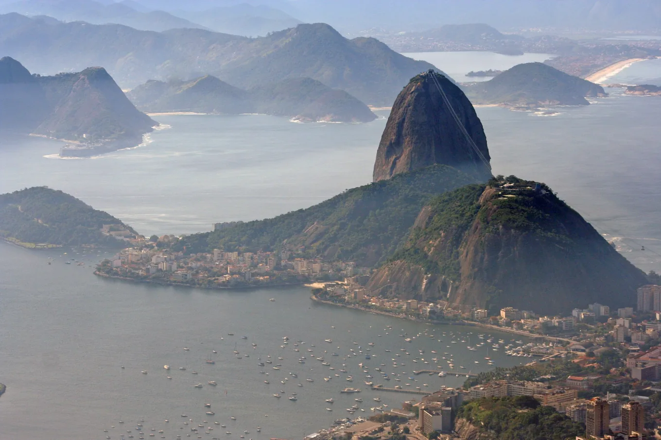 Sugarloaf above the bay, with boats moored at its foot
